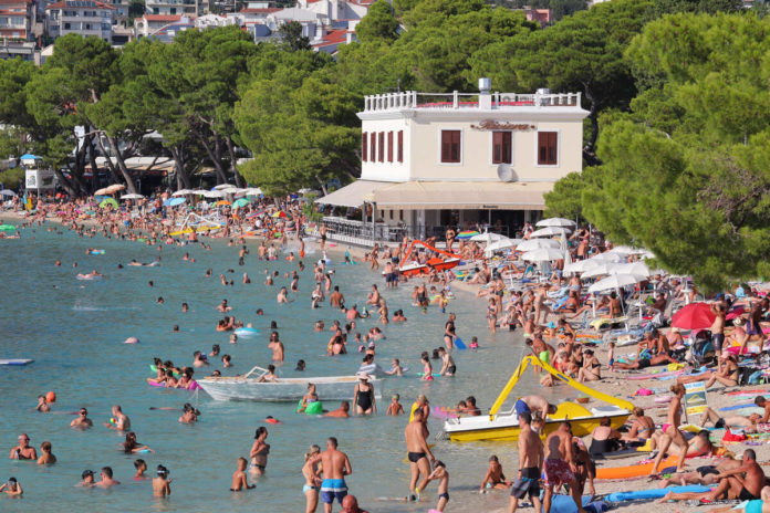 Crowded Beach In Makarska Croatia Overtourism Concept