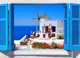 Greece: Passenger Visitors Elevated by 9.4% at 14 Regional Airports in August, In comparison with 2019 Famous windmill in Oia village Santorini island Greece