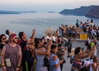 Surge in Tourism Resulting in ‘Summerless’ Greece for Locals? Santorini Oia Sunset tourists