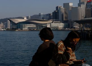 China to renew issuing passports for tourism as COVID controls fall