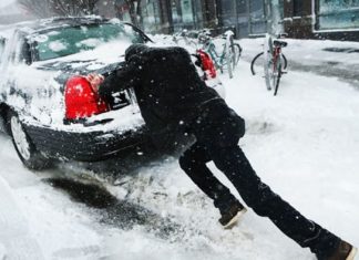 Learn how to get automobile unstuck from snow, checklist of emergency provides to take with you