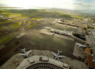 Building at Hawaii airport triggering mass flight delays